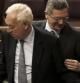 Los ministros de Exteriores, José Manuel García-Margallo (i) y Justicia, Alberto Ruiz Gallardón, durante su intervención en la sesión de control al Gobierno celebrada en el Congreso.