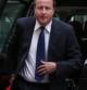 David Cameron a su llegada a Downing Street tras adelantar el final de sus vacaciones por la crisis en Siria