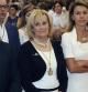 La presidenta de Castilla-La Mancha, María Dolores de Cospedal (d), junto a la alcaldesa de Albacete Carmen Bayod, y el concejal de Cultura, Manuel Serrano (i), durante la misa en honor de la Virgen de los Llanos, en la catedral de Albacete, ciudad que celebra r su Feria, declarada de Interés Turístico internacional.