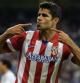 El delantero brasileño Diego Costa celebra tras marcar ante el Real Madrid
