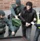 Agentes de la Guardia Civil trasladan a Jon Enparantza, detenido en la operación contra miembros del grupo de enlace con el colectivo de presos de ETA (EPPK)