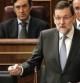 El presidente del Gobierno, Mariano Rajoy, junto a la vicepresidenta, Soraya Sáenz de Santamaría, durante su intervención en la sesión de control al Ejecutivo en el Congreso de los Diputados.
