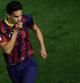 Marc Bartra celebra su gol al Real Madrid besando el escudo del Barça