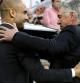 Ancelotti saluda a Guardiola durante el partido de ida de semifinales de Champions