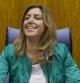 La presidenta de la Junta y secretaria general del PSOE-A, Susana Díaz (c), bajo un retrato del Rey Juan Carlos en el Parlamento regional en Sevilla, donde ha presidido una reunión con el grupo socialista.