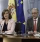 La vicepresidenta del Gobierno, Soraya Sáenz de Santamaría, y el ministro de Hacienda, Cristóbal Montoro, durante la rueda de prensa tras la reunión del Consejo de Ministros