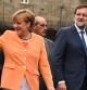 Angela Merkel y Mariano Rajoy pasean frente a la catedral de Santiago de Compostela