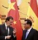 Mariano Rajoy habla con el primer ministro chino Li Keqiang el 25 de septiembre de 2014 en Beijing