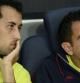 Sergio Busquets y Xavi Hernández en el banquillo del Barça