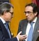 Josep Rull y el president Artur Mas, charlan en el hemiciclo del Parlament
