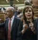 La vicepresidenta Soraya Sáenz de Santamaría habla con el ministro del Interior, Jorge Fernández Díaz, en el Congreso de los Diputados, con el ministro de Hacienda, Cistóbal Montoro en el fondo