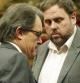 Mas y Junqueras se cruzan en el hemiciclo del Parlament.
