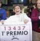 Los loteros de la administración de lotería número 2 de La Eliana (Valencia) celebran la venta de cinco series del primer premio de la Lotería de Navidad, el 13.437, lo que supone un premio de 20 millones de euros