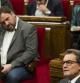Oriol Junqueras observa al president Mas en un pleno del Parlament