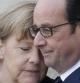 François Hollande abraza a Merkel a su llegada al Eliseo.