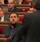 El presidente de ERC Oriol Junqueras atiende la intervención del president Artur Mas.