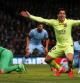 Luis Suárez celebra uno de sus goles ante el Manchester City