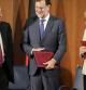 Mariano Rajoy junto a la canciller alemana Angela Merkel y el presidente de la CEOE, Juan Rosell, durante el Encuentro Empresarial Germano-Español