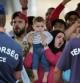 Protesta de refugiados en la estación de Budapest pidiendo poder subir a los trenes de camino a Alemania
