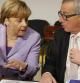 Juncker y Merkel en La Valeta, antes de una reunión informal del Consejo de la UE celebrada tras la segunda jornada de la Cumbre de La Valeta sobre migración