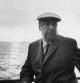13th June 1966:  EXCLUSIVE Chilean poet and activist Pablo Neruda (1904 - 1973) leans on a ship's railing during the 34th annual PEN boat ride around New York City. He wears a cap.  (Photo by Sam Falk/New York Times Co./Getty Images)