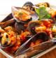Mejillones con vinagreta de tomates secos y pistachos