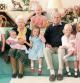 An undated handout picture released by Kensington Palace on April 14, 2021 shows Britain's Queen Elizabeth II and Britain's Prince Philip, Duke of Edinburgh with their great grandchildren. Pictured (L-R) are Britain's Prince George of Cambridge, Britain's Prince Louis of Cambridge being held by Britain's Queen Elizabeth II, Savannah Phillips (standing at rear), Britain's Princess Charlotte of Cambridge, Britain's Prince Philip, Duke of Edinburgh, Isla Phillips holding Lena Tindall, and Mia Tindall. (Photo by THE DUCHESS OF CAMBRIDGE / KENSINGTON PALACE / AFP) / RESTRICTED TO EDITORIAL USE - MANDATORY CREDIT 