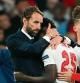 Soccer Football - Euro 2020 - Final - Italy v England - Wembley Stadium, London, Britain - July 11, 2021 England manager Gareth Southgate and Bukayo Saka look dejected after loosing the Euro 2020 final Pool via REUTERS/Andy Rain