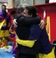 Abrazo entre el capitán Messi y el presidente Laporta