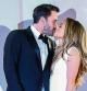 Jennifer Lopez, right, and Ben Affleck kiss upon arrival at the premiere of the film 'The Last Duel' during the 78th edition of the Venice Film Festival in Venice, Italy, Friday, Sept. 10, 2021. (Photo by Joel C Ryan/Invision/AP) *** Local Caption *** .