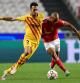 Barcelona's Spanish midfielder Sergio Busquets vies with Benfica's Portuguese midfielder Joao Mario (R) during the UEFA Champions League first round group E footbal match between Benfica and Barcelona at the Luz stadium in Lisbon on September 29, 2021. (Photo by PATRICIA DE MELO MOREIRA / AFP)