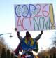 An activists holds up a placard arriving for a 