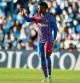 VIGO, SPAIN - NOVEMBER 06: Ansu Fati of FC Barcelona holds his hand up to call for medical attention during the La Liga Santander match between RC Celta de Vigo and FC Barcelona at Abanca-BalaÃ­dos on November 06, 2021 in Vigo, Spain. (Photo by Juan Manuel Serrano Arce/Getty Images)