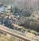 Kuznica-bruzgi (Poland), 08/11/2021.- A frame grab taken from footage made available by Poland's Ministry of National Defence (MON) shows a group of migrants walking along a road leading to the Belarusian-Polish border, Belarus, 08 November 2021. On 08 November, the Belarusian website Nasha Niva posted on its Telegram channel video footage of what appeared to be hundreds of migrants walking along a road leading to the Belarusian-Polish border. Other recordings posted online show migrants gathering by a car park in front of the border crossing in Bruzgi on the Belarusian side of the border. (Bielorrusia, Polonia) EFE/EPA/POLAND'S MINISTRY OF NATIONAL DE -- BEST QUALITY AVAILABLE -- POLAND OUT HANDOUT EDITORIAL USE ONLY/NO SALES