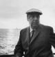 13th June 1966: EXCLUSIVE Chilean poet and activist Pablo Neruda (1904 - 1973) leans on a ship's railing during the 34th annual PEN boat ride around New York City. He wears a cap. (Photo by Sam Falk/New York Times Co./Getty Images)