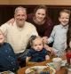 This photo provided by the family shows from left, David Bennett Jr., Preston Bennett, David Bennett Sr., Gillian Bennett, Nicole (Bennett) McCray, Sawyer Bennett, Kristi Bennett in 2019. In a medical first, doctors transplanted a pig heart into Bennett Sr., in a last-ditch effort to save his life and the hospital said Monday, Jan. 10, 2022 that he's doing well three days after the highly experimental surgery. (Byron Dillard via AP)