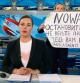 This video grab taken on March 15, 2022 shows Russian Channel One editor Marina Ovsyannikova holds a poster reading 