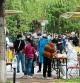 BEIJING, CHINA - APRIL 29: People wait in line for a swab test at a COVID-19 test site on April 29, 2022 in Beijing, China. China is trying to contain a spike in coronavirus cases in capital Beijing, after dozens of people tested positive for the virus in recent days. Local authorities have initiated mass testing in most districts and locked down some neighbourhoods where cases are found in an effort to maintain the country's zero COVID strategy. (Photo by Lintao Zhang/Getty Images)