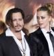 (FILES) In this file photo taken on November 21, 2015 Actors Johnny Depp (L) and Amber Heard attend the Los Angeles Premiere of
