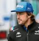 Alpine driver Fernando Alonso of Spain walks through paddock prior the Hungarian Formula One Grand Prix at the Hungaroring racetrack in Mogyorod, near Budapest, Hungary, Sunday, July 31, 2022. (AP Photo/Anna Szilagyi)