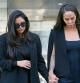 Vanessa Bryant, left, the widow of the late Kobe Bryant, holds hands with friend, Sydney Leroux as they leave a federal courthouse in Los Angeles Friday, Aug. 19, 2022. Vanessa Bryant testified Friday that she was only beginning to grieve the loss of her husband, basketball star Kobe Bryant, and their 13-year-old daughter Gianna when she was faced with the fresh horror of learning that sheriff's deputies and firefighters had shot and shared photos of their bodies at the site of the helicopter crash that killed them. (AP Photo/Damian Dovarganes)