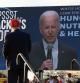 MIAMI, FLORIDA - NOVEMBER 06: Former U.S. President Donald Trump watches a video of President Joe Biden playing during a rally for Sen. Marco Rubio (R-FL) at the Miami-Dade Country Fair and Exposition on November 6, 2022 in Miami, Florida. Rubio faces U.S. Rep. Val Demings (D-FL) in his reelection bid in Tuesday's general election.   Joe Raedle/Getty Images/AFP