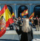 Varias personas, con banderas de España con el águila de San Juan, asisten a un acto organizado por el Movimiento Católico español (MCE) en memoria de Francisco Franco y José Antonio Primo de Rivera, en la Plaza de Oriente, a 20 de noviembre de 2022, en Madrid (España). El acto se celebra para conmemorar a Francisco Franco cuando se cumplen 47 años de su muerte y al fundador de La Falange, José Antonio Primo de Rivera en el 86º aniversario de su fusilamiento. Esta es la primera ocasión en la que el aniversario de muerte de ambos se celebra tras la entrada en vigor de la Ley de Memoria Democrática que incluye que el complejo monumental del Valle de los Caídos vuelva a su denominación original del Valle de Cuelgamuros y que se reubiquen los restos de José Antonio Primo de Rivera. La Delegación del Gobierno en Madrid ha autorizado todos los actos con motivo del 20-N. 20 NOVIEMBRE 2022;CONCENTRACIÓN;BANDERA DE ESPAÑA;BANDERA AGUILUCHO;BANDERA AGUILA DE SAN JUAN; Alejandro Martínez Vélez / Europa Press 20/11/2022