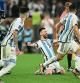 Soccer Football - FIFA World Cup Qatar 2022 - Final - Argentina v France - Lusail Stadium, Lusail, Qatar - December 18, 2022 Argentina's Lionel Messi celebrates with Leandro Paredes after winning the World Cup REUTERS/Dylan Martinez