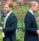 FILE - Prince Harry, left, and Prince William stand together during the unveiling of a statue they commissioned of their mother Princess Diana, on what would have been her 60th birthday, in the Sunken Garden at Kensington Palace, London, Thursday July 1, 2021. Prince Harry has said he wants to have his father and brother back and that he wants “a family, not an institution,” during a TV interview ahead of the publication of his memoir. The interview with Britain’s ITV channel is due to be released this Sunday. (Dominic Lipinski /Pool Photo via AP, File)