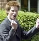 FILE - Britain's Prince Harry, 18, punches the air as he leaves Eton College on his last day at the top public school where he has been a pupil for five years, in Windsor, England, on June 12, 2003. An explosive memoir reveals many facets of Prince Harry, from bereaved boy and troubled teen to wartime soldier and unhappy royal. From accounts of cocaine use and losing his virginity to raw family rifts, “Spare” exposes deeply personal details about Harry and the wider royal family. It is dominated by Harry's rivalry with brother Prince William and the death of the boys’ mother, Princess Diana in 1997. (AP Photo/Dave Caulkin, File)