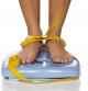 woman's feet on a domestic weight scale and measuring tape around them