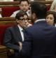 GRAFCAT2319 BARCELONA 19/10/2022.- El primer secretario del PSC i portavoz del grupo socialista en el Parlament, Salvador Illa, observa al presidente de la Generalitat, Pere Aragonés durante el pleno del Parlament para dar cuenta de la remodelación del Govern tras la salida de JxCat. EFE/Quique Garcia