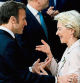 France's President Emmanuel Macron (L) shares a laugh ahead with European Commission President Ursula von der Leyen as EU leaders gather for a family picture ahead of a summit in Brussels, on February 9, 2023. - Ukraine's President is set to attend an EU summit in Brussels on February 9, 2023, as the guest of honour where he will press allies to deliver fighter jets