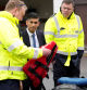 Britain's Prime Minister Rishi Sunak, second center, speaks with members of the Home Office contracted staff, while looking at a lifevest and rubber dinghy, during a visit to a Home Office joint control room in Dover, Kent, England, Britain Tuesday, March 7, 2023.     Kirsty Wigglesworth/Pool via REUTERS